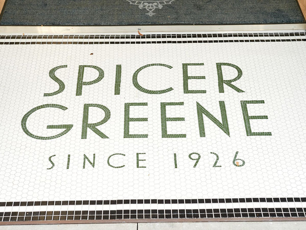 Custom mosaic entrance floor reading Spicer Greene since 1926