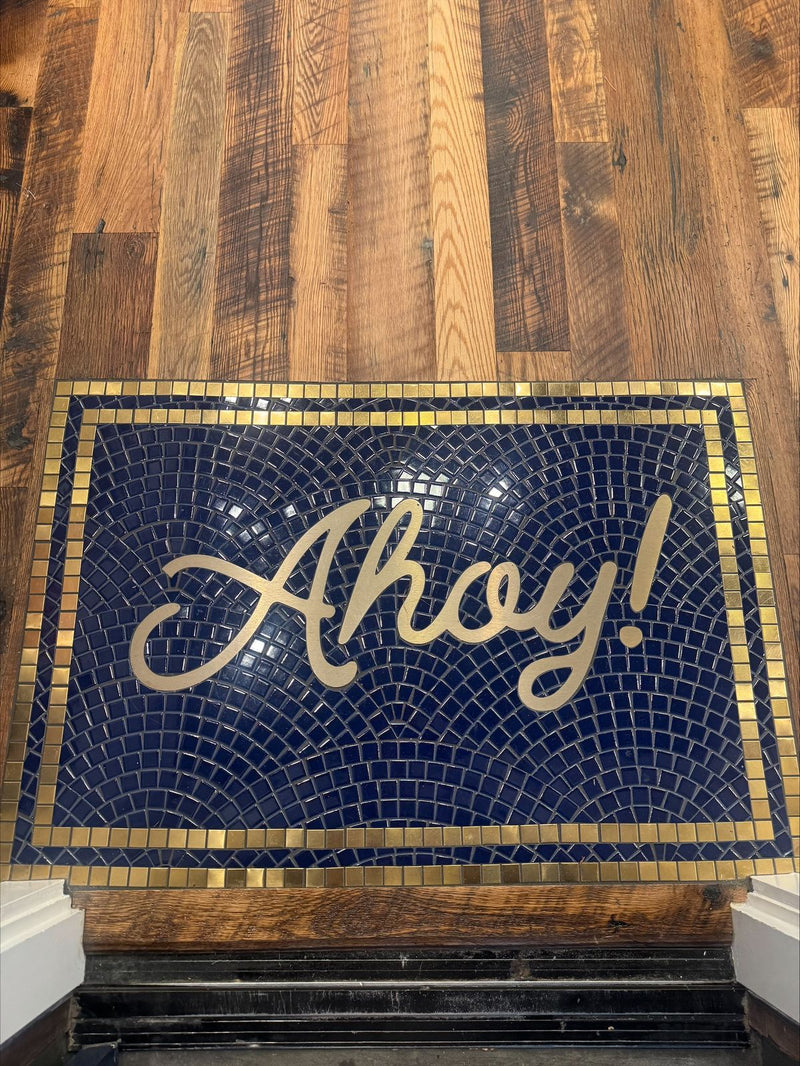 Ahoy! mosaic: Gold metal on a navy fan