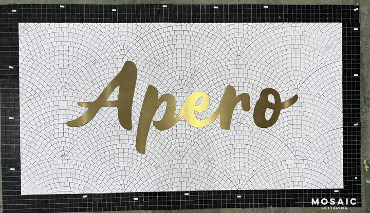 Apero gold script mosaic, ready to ship, bar logo mosaic by Mosaic Lettering, photographed at our studio before installation