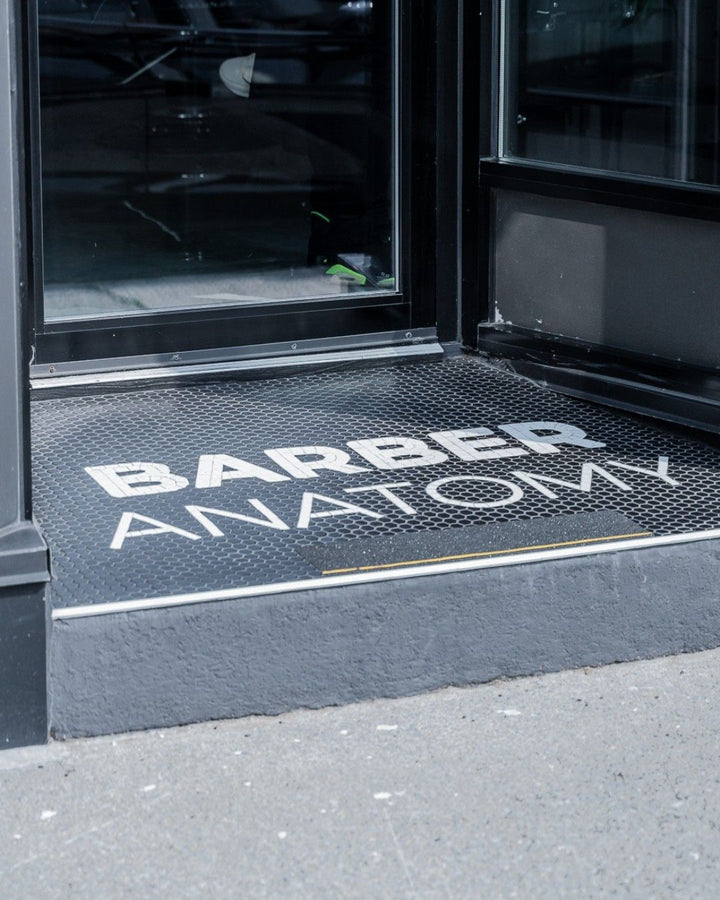 Barber Anatomy black entrance mosaic, business logo mosaic by Mosaic Lettering