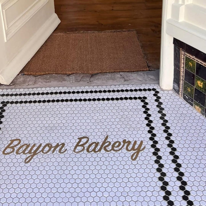 Bayon Bakery gold script hexagon mosaic, restaurant logo mosaic by Mosaic Lettering