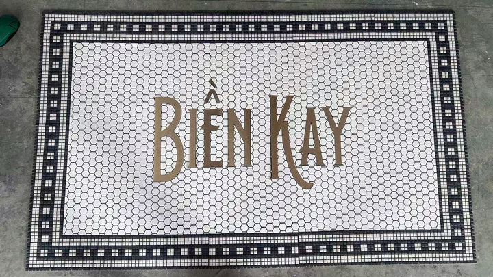 Bien Kay runner mosaic, restaurant logo mosaic by Mosaic Lettering, photographed at our studio before installation
