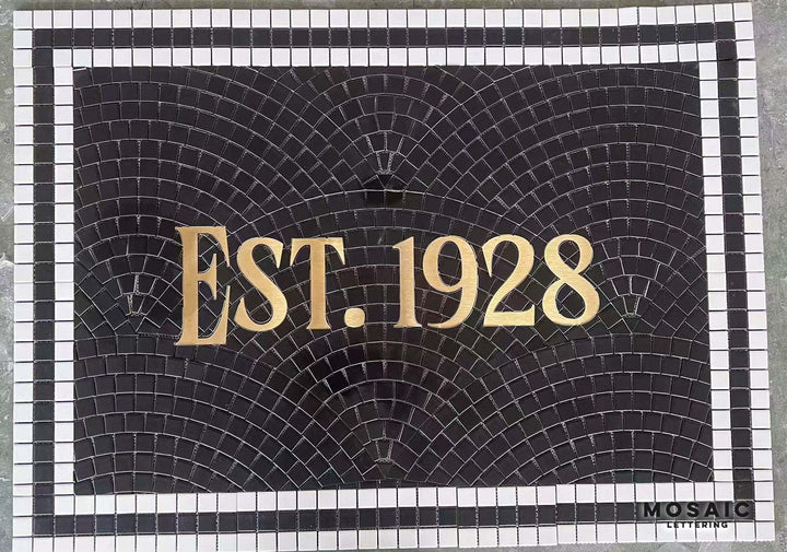 EST. 1928 gold on black mosaic, house number mosaic by Mosaic Lettering, photographed at our studio before installation