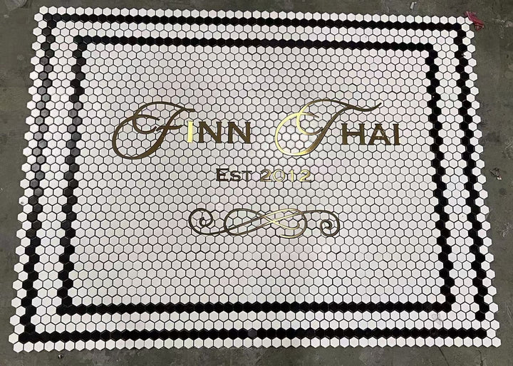 Finn Thai gold lettering mosaic, restaurant logo mosaic by Mosaic Lettering, photographed at our studio before installation