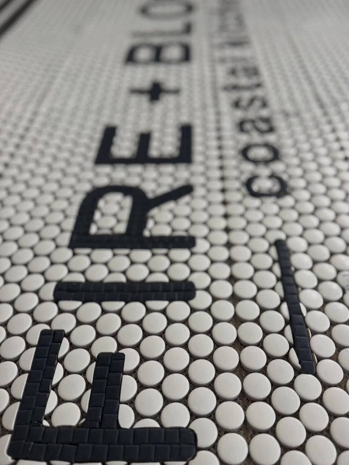 Fire Coastal penny tile lettering