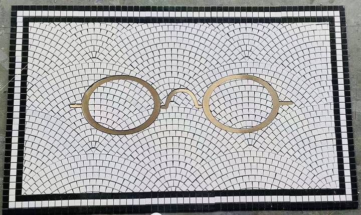 Gold glasses fanned mosaic for optician, business logo mosaic by Mosaic Lettering, photographed at our studio before installation