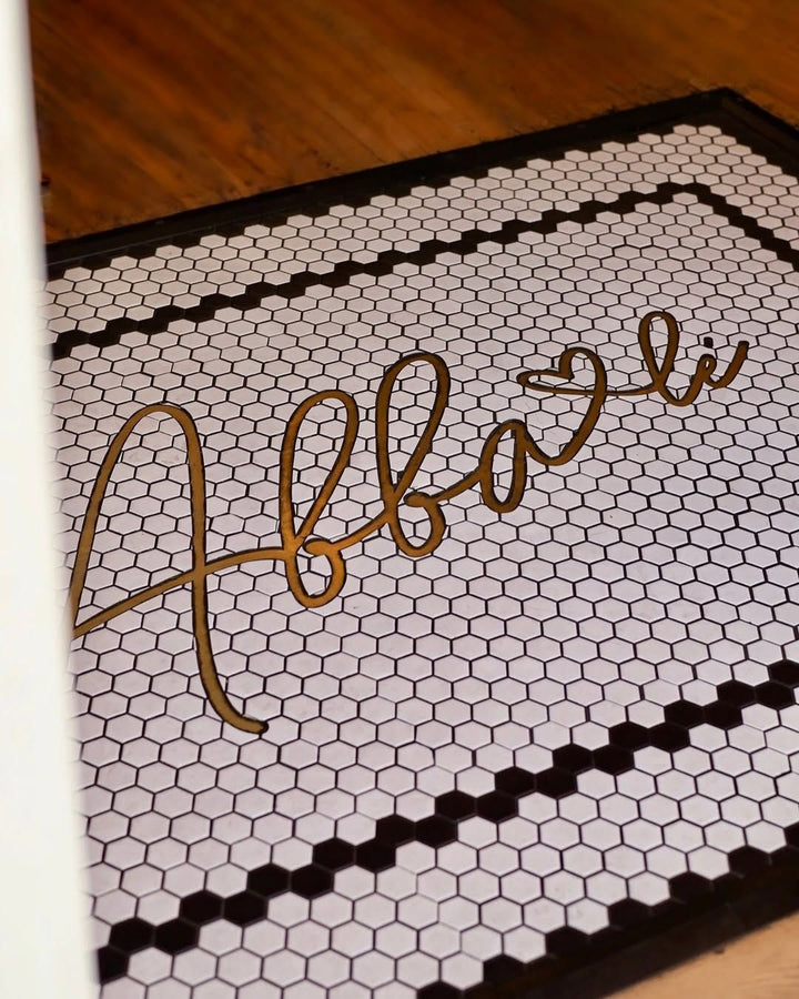 Gold script lettering on hexagon tile, gold metal lettering mosaic by Mosaic Lettering