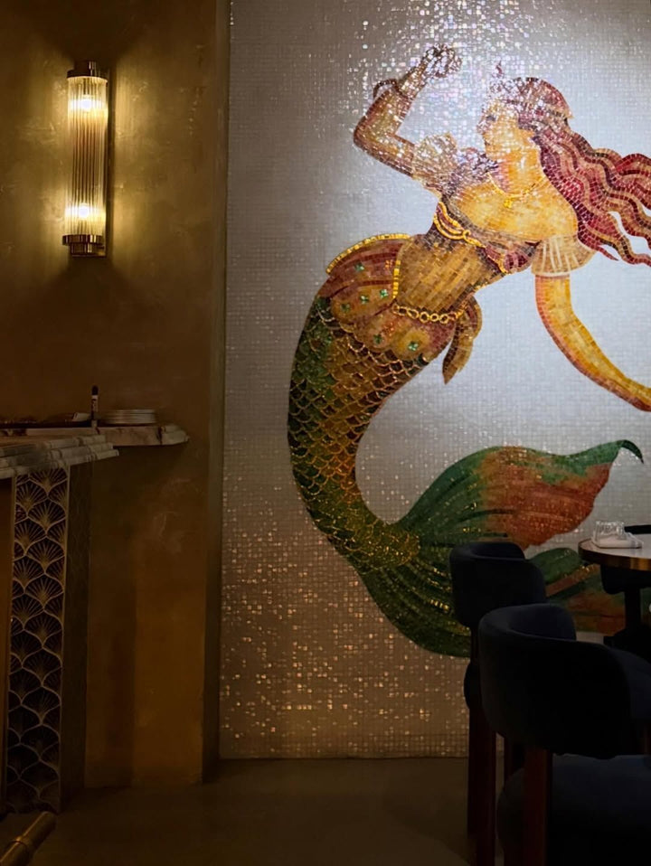 Hand-cut mermaid wall mosaic in bar, bar logo mosaic by Mosaic Lettering