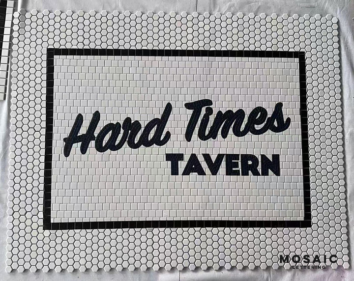 Hard Times Tavern script mosaic, bar logo mosaic by Mosaic Lettering, photographed at our studio before installation