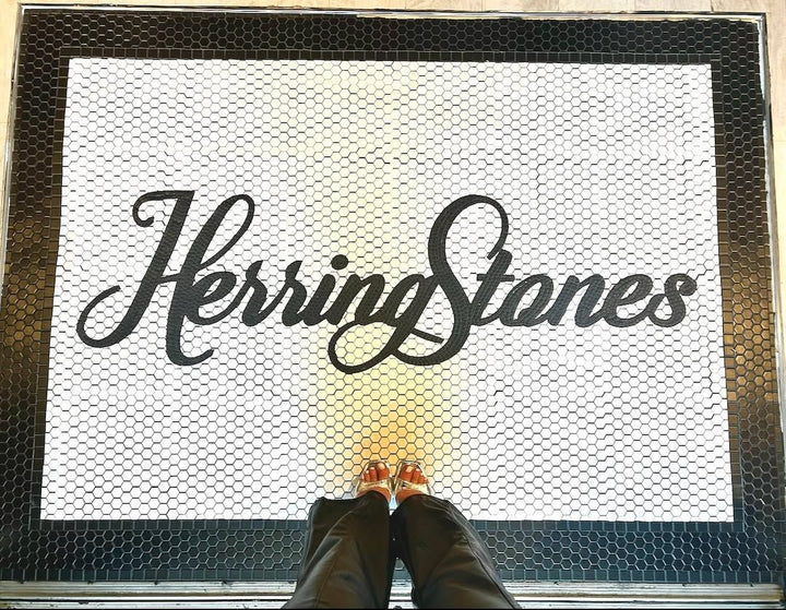 Herring Stones script mosaic, restaurant logo mosaic by Mosaic Lettering