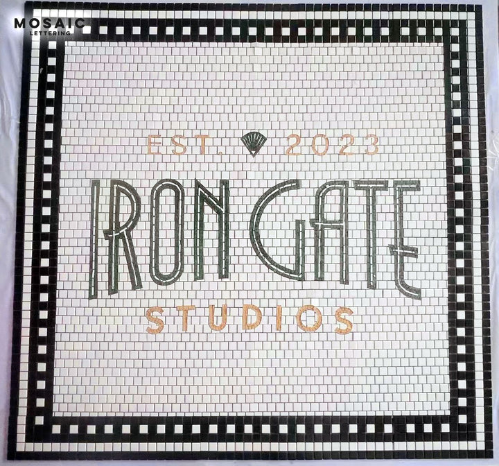 Iron Gate Studios gold lettering mosaic, business logo mosaic by Mosaic Lettering, photographed at our studio before installation