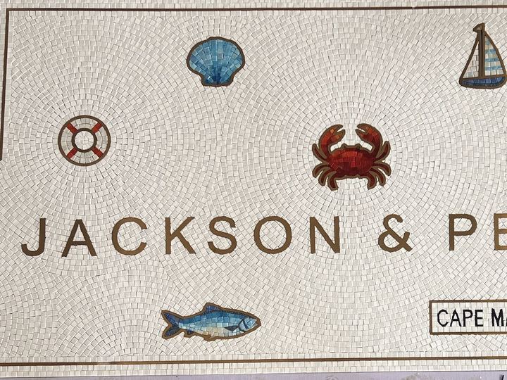 Jackson & Perry nautical icons close-up, restaurant logo mosaic by Mosaic Lettering, photographed at our studio before installation