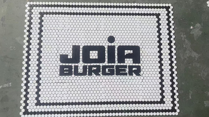 Joia Burger logo mosaic, restaurant logo mosaic by Mosaic Lettering, photographed at our studio before installation
