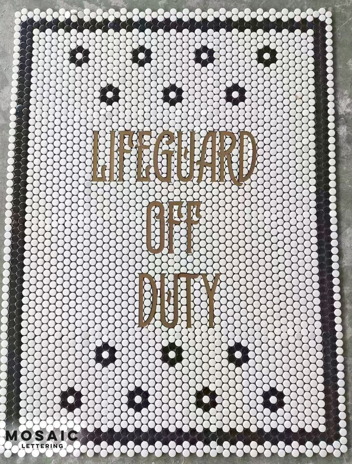 Lifeguard Off Duty mosaic, pool and bathroom mosaic by Mosaic Lettering, photographed at our studio before installation