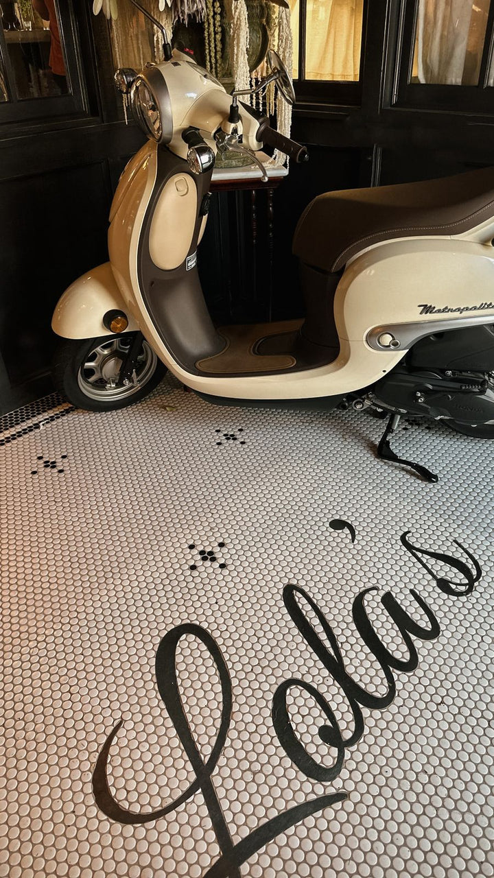 Lola's script entrance mosaic, restaurant logo mosaic by Mosaic Lettering