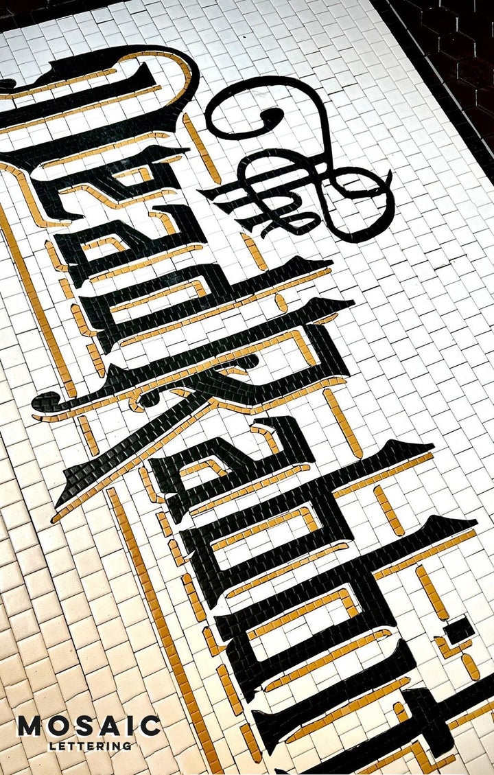 Mad Rabbit gothic lettering floor mosaic, bar logo mosaic by Mosaic Lettering
