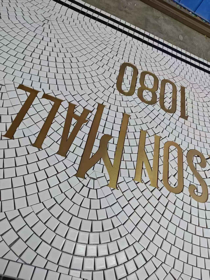 Mason Mall 1080 fanned mosaic with gold lettering, business logo mosaic by Mosaic Lettering, photographed at our studio before installation
