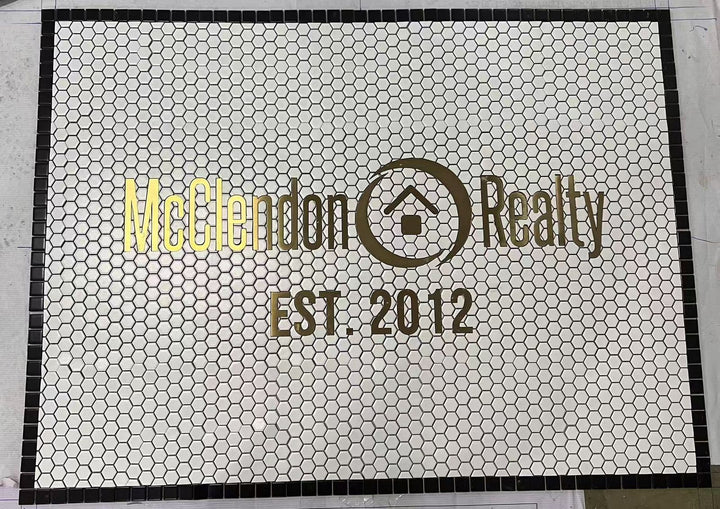 McClendon Realty logo mosaic, business logo mosaic by Mosaic Lettering, photographed at our studio before installation