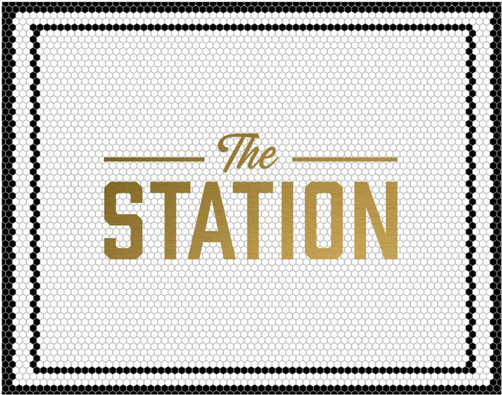 The station mockup design by Mosaic Lettering