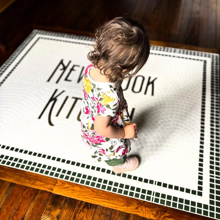 New York Kitchen entrance mosaic, restaurant logo mosaic by Mosaic Lettering