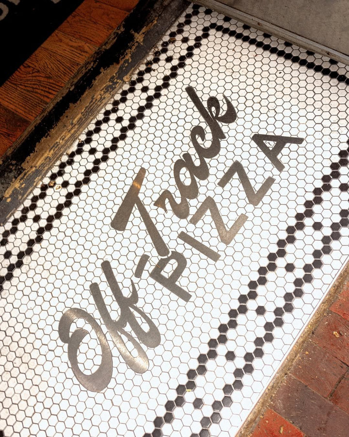 Off-Track Pizza lettering mosaic, restaurant logo mosaic by Mosaic Lettering