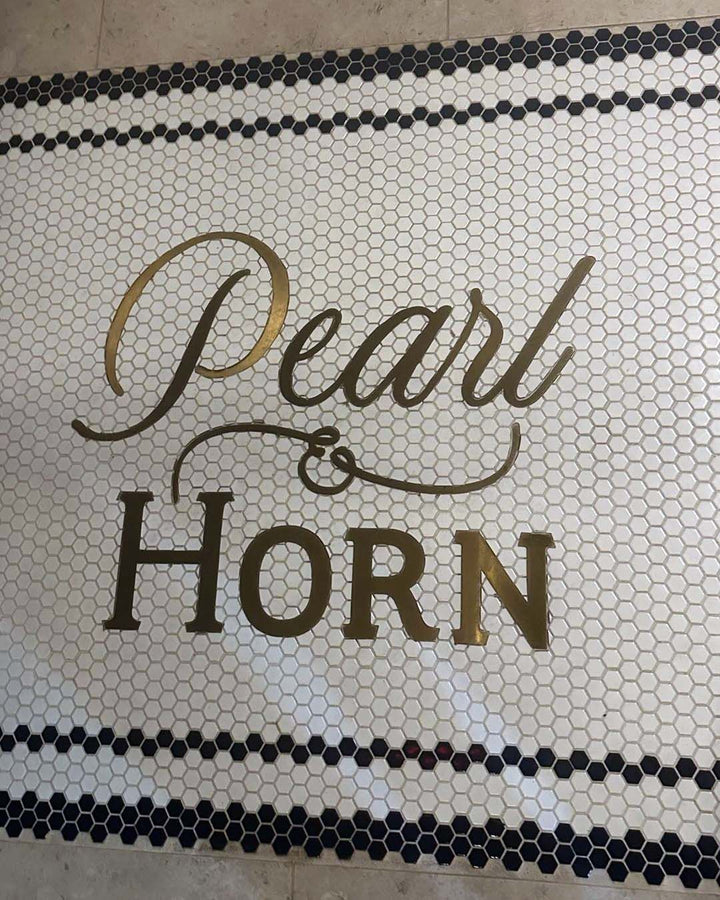 Pearl & Horn gold script hexagon mosaic, bar logo mosaic by Mosaic Lettering