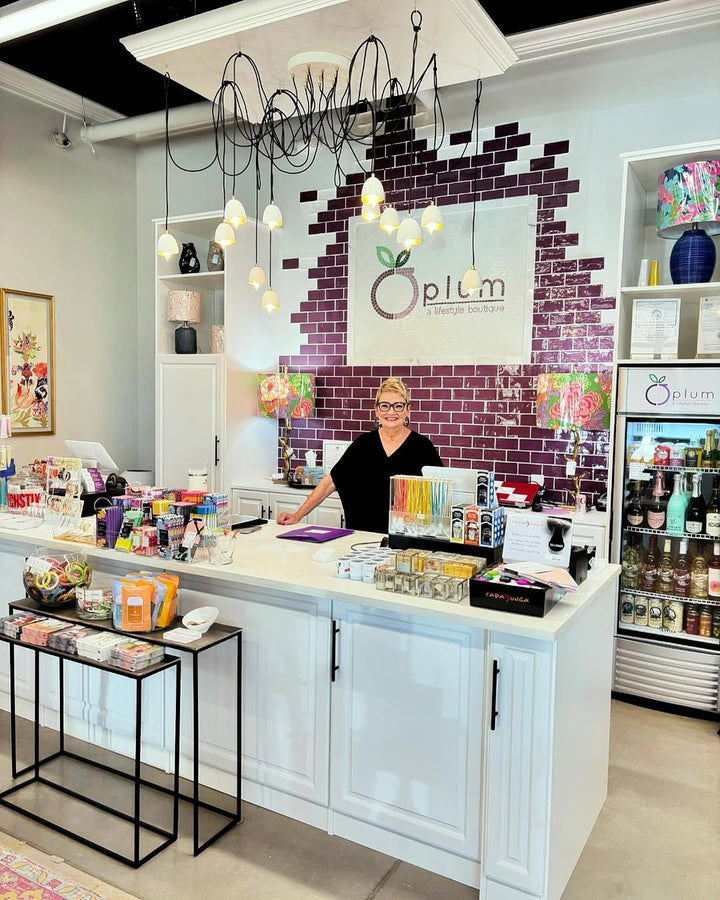 Plum lifestyle boutique wall mosaic, business logo mosaic by Mosaic Lettering