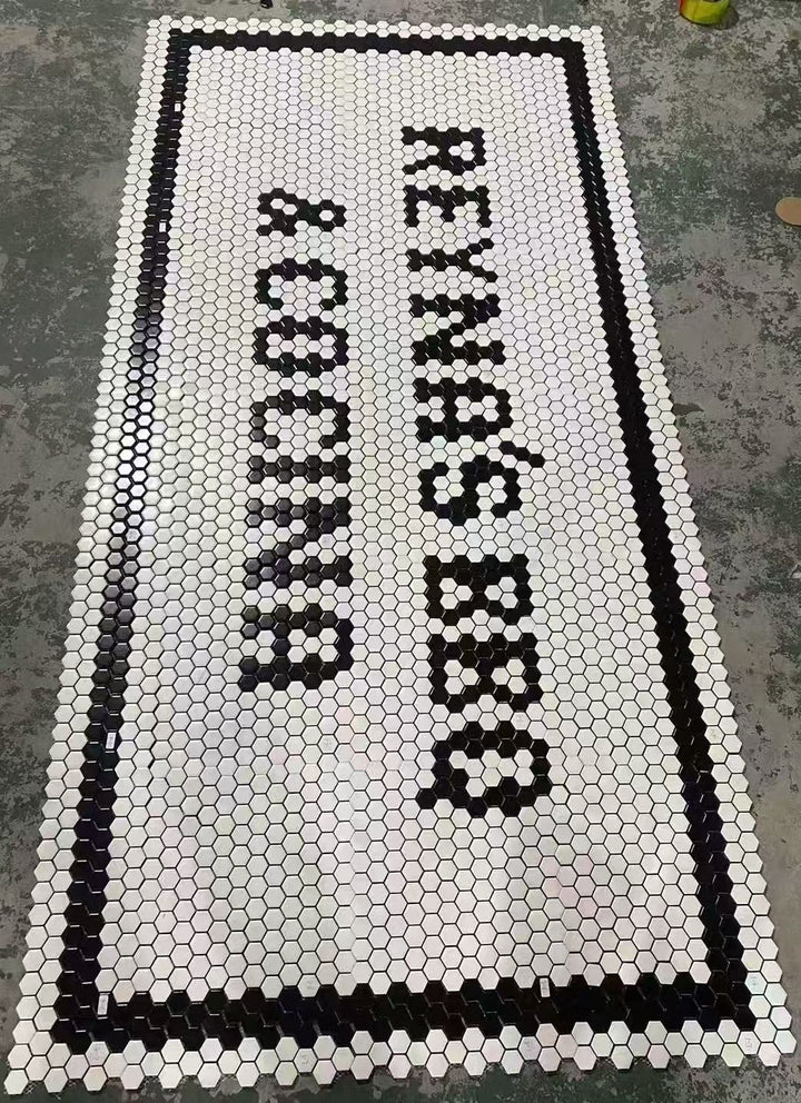 Reyna's BBQ & Cocina runner, restaurant logo mosaic by Mosaic Lettering, photographed at our studio before installation