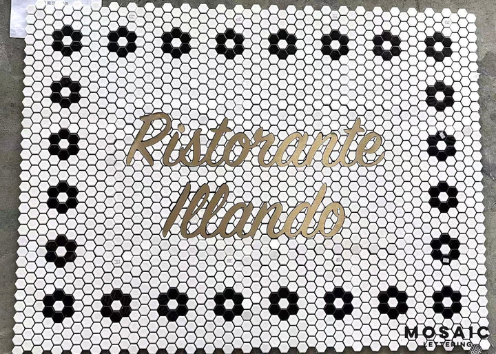 Ristorante Illando gold script mosaic, restaurant logo mosaic by Mosaic Lettering, photographed at our studio before installation