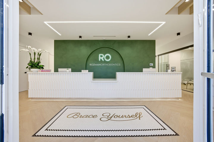 RO medical clinic reception floor mosaic, business logo mosaic by Mosaic Lettering