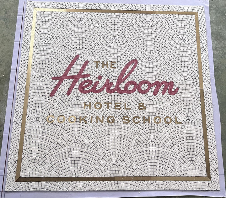 The Heirloom Hotel & Cooking School mosaic, hotel entrance mosaic by Mosaic Lettering, photographed at our studio before installation