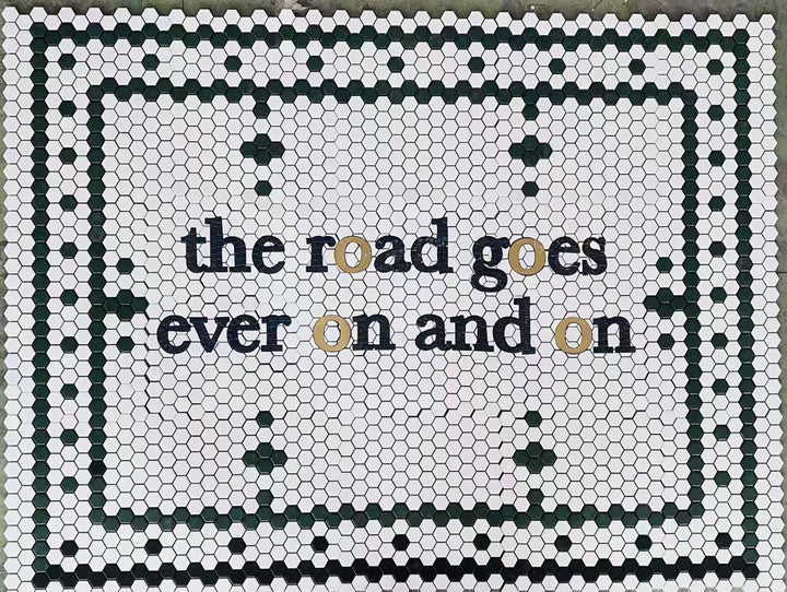 The road goes ever on and on quote mosaic, house number mosaic by Mosaic Lettering, photographed at our studio before installation