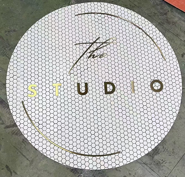 The Studio round fanned mosaic, business logo mosaic by Mosaic Lettering, photographed at our studio before installation
