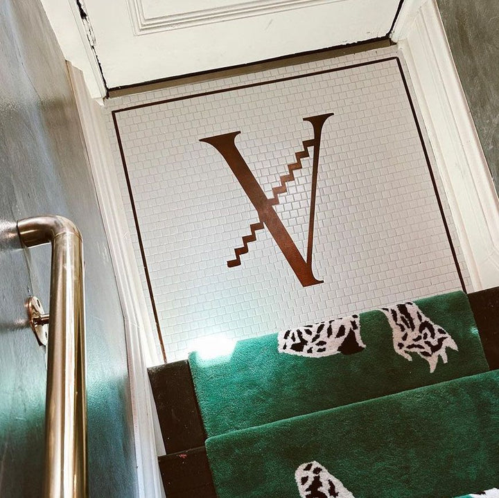 V monogram stair landing mosaic, house number mosaic by Mosaic Lettering
