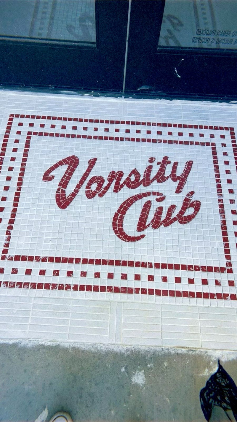 Varsity Club mosaic: Script on square tile