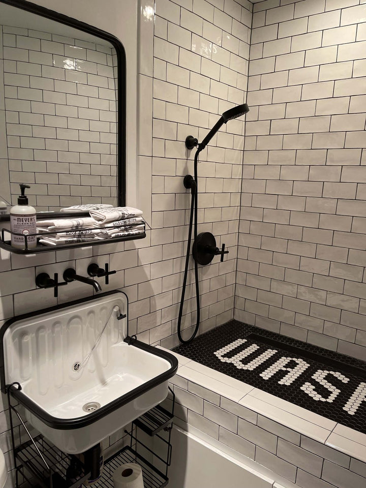 WASH lettering shower floor mosaic, pool and bathroom mosaic by Mosaic Lettering