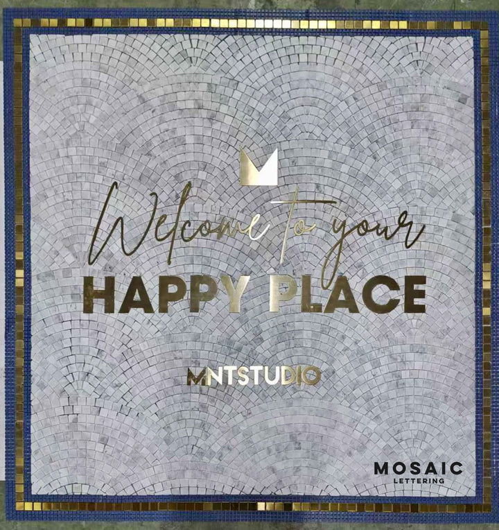 Welcome to your Happy Place marble mosaic, business logo mosaic by Mosaic Lettering, photographed at our studio before installation
