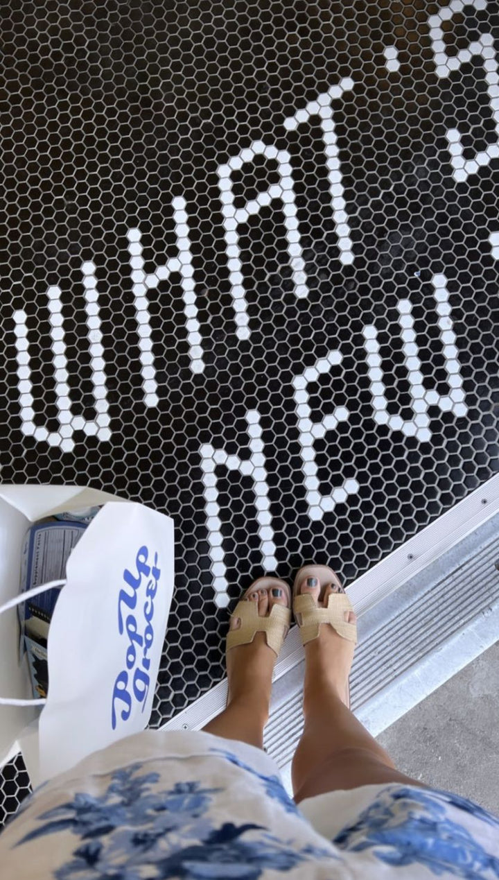 What's New penny tile lettering, business logo mosaic by Mosaic Lettering