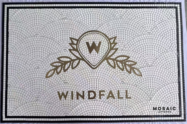 Windfall gold crest fanned mosaic, business logo mosaic by Mosaic Lettering, photographed at our studio before installation