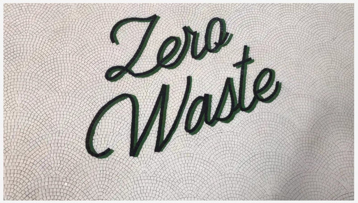 Zero Waste script mosaic, business logo mosaic by Mosaic Lettering, photographed at our studio before installation